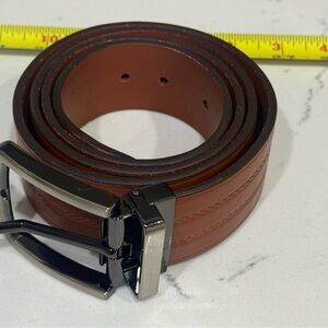 NAB adjustable full grain leather belt. Fits up to 40”